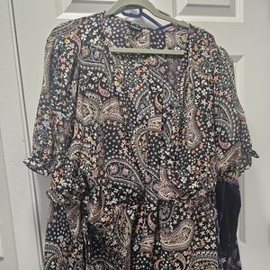 Surpice top with ruffle sleeves.